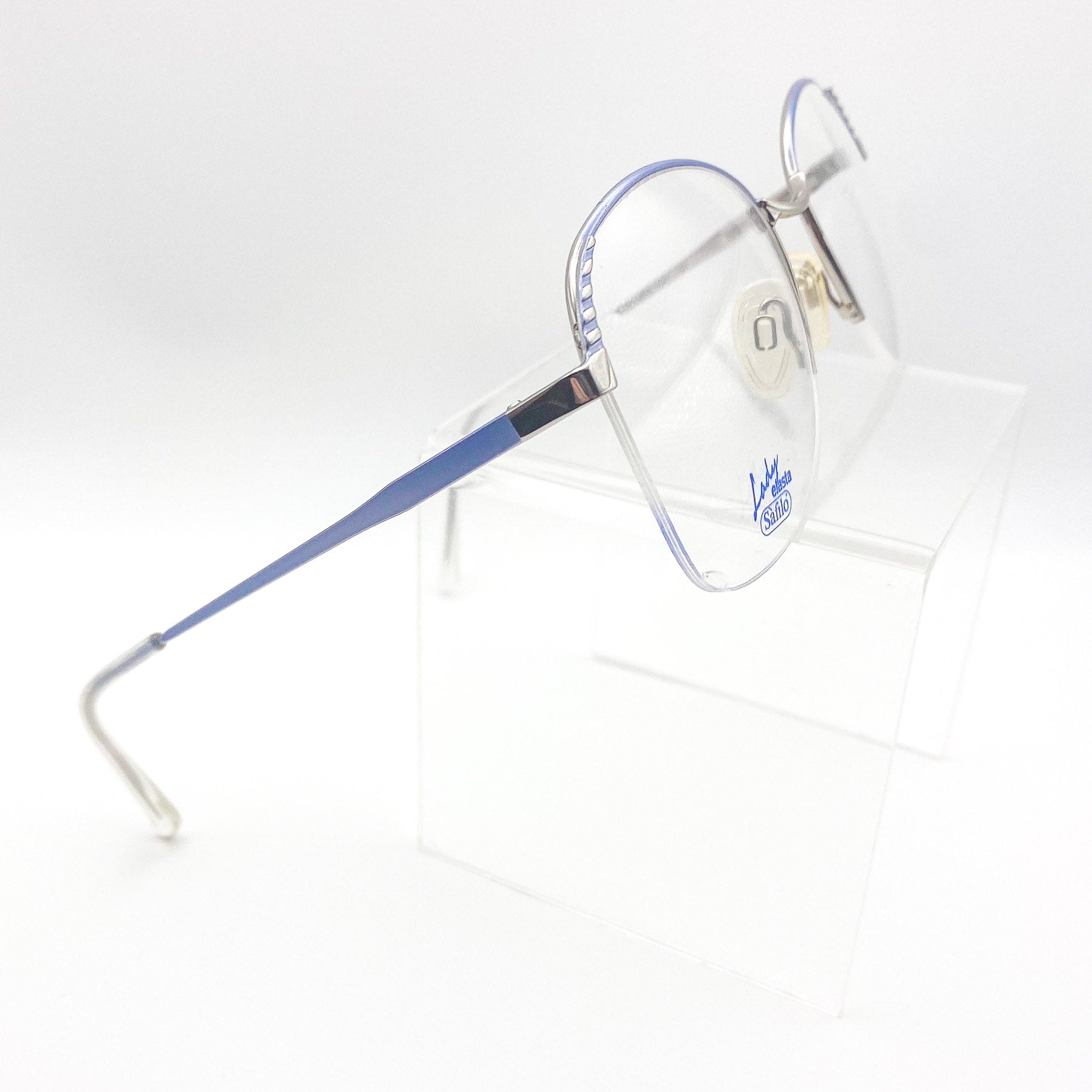 Metal eyeglasses with blue and silver frame on a white background