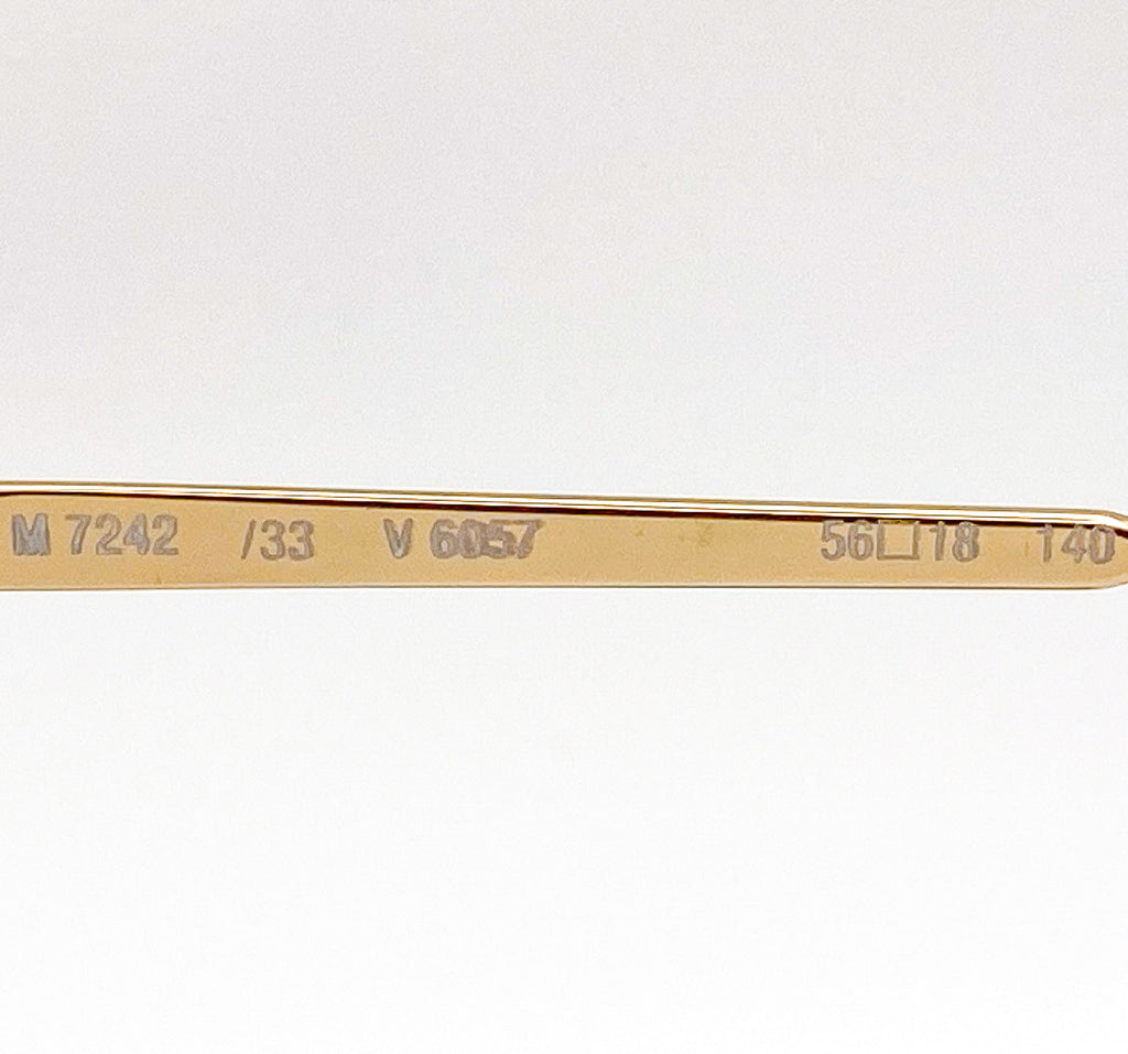 gold eyeglasses frame arm with model information