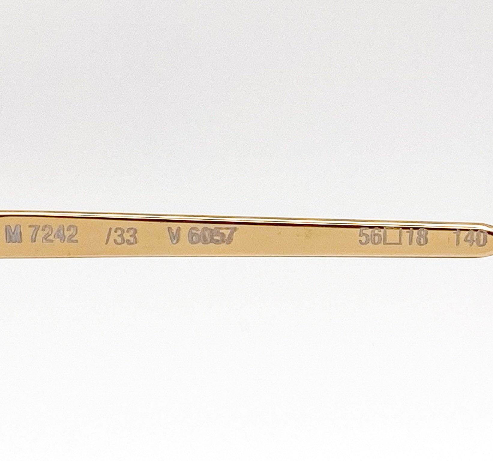 gold eyeglasses frame arm with model information