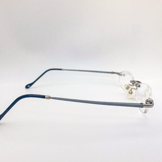 Eyeglasses with blue frames on a white background