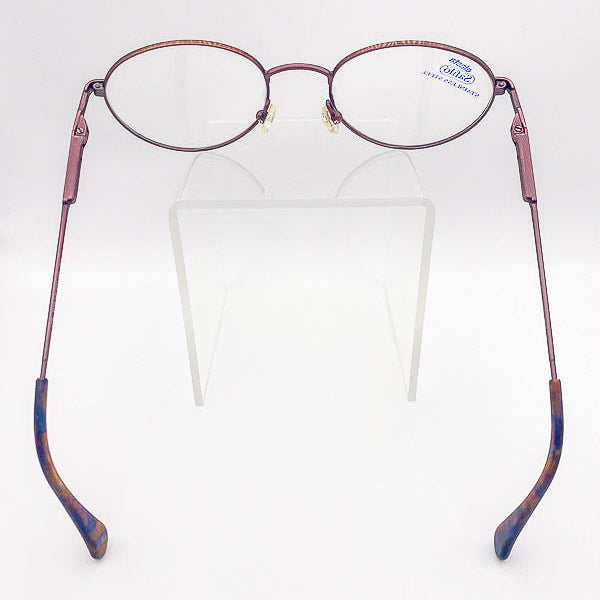 Pair of eyeglasses with a colorful frame on a white background