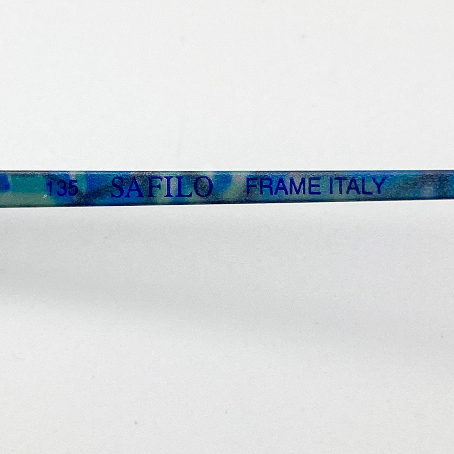 Safilo frame with '135' and 'FRAME ITALY' text on a white background