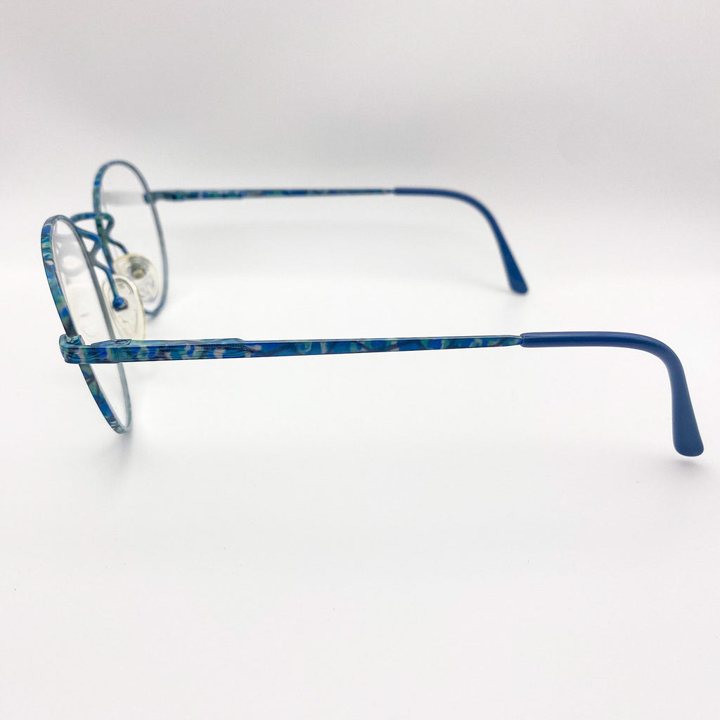 Blue eyeglasses on a white background