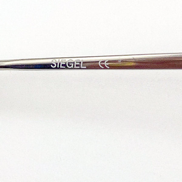 Close-up of a Siegel frame on a white background