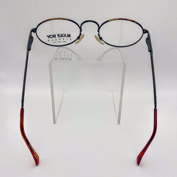 Vintage eyeglasses with tortoiseshell frame on a white background