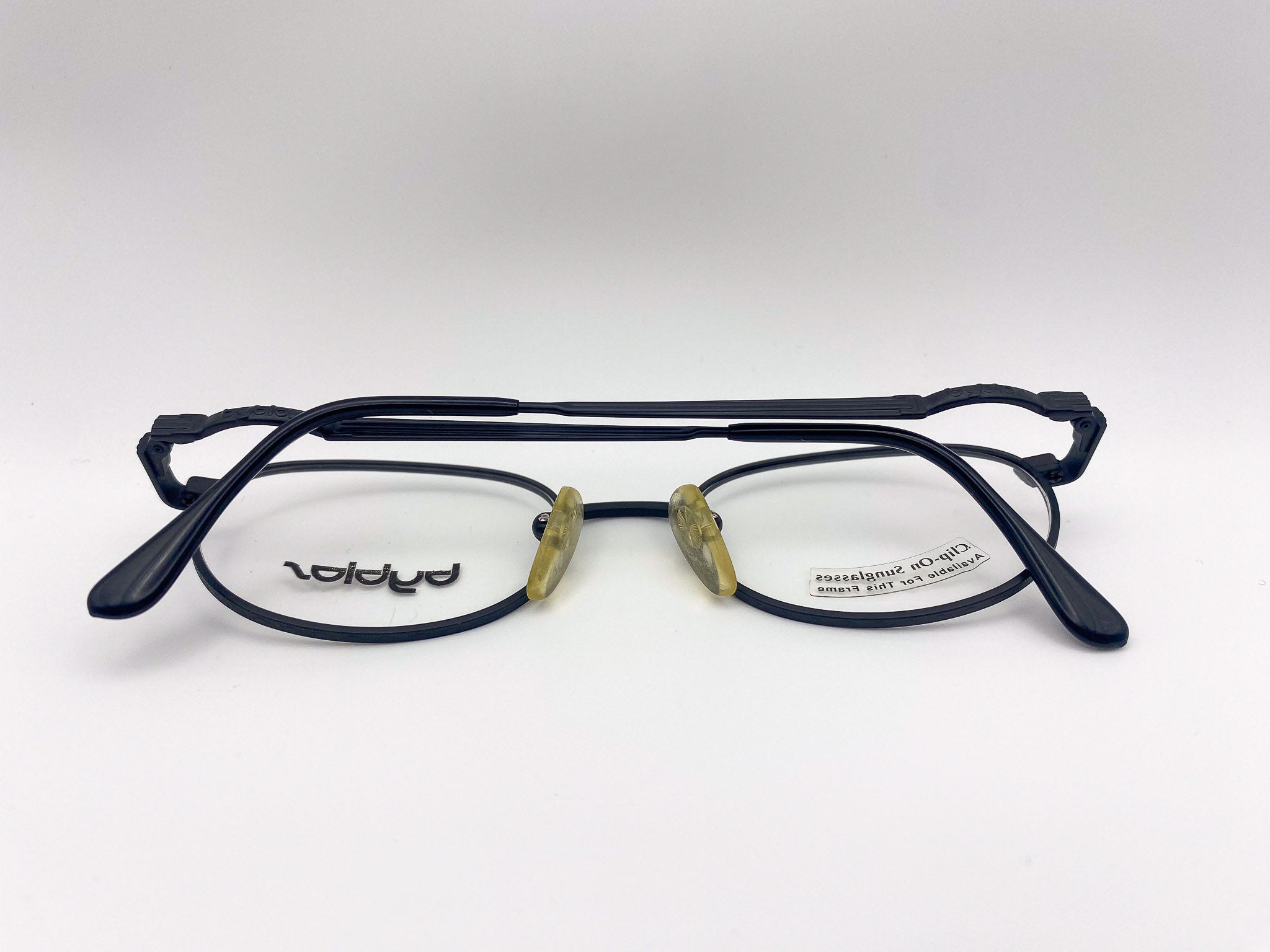 Pair of eyeglasses with black frame and clear lenses on a white background