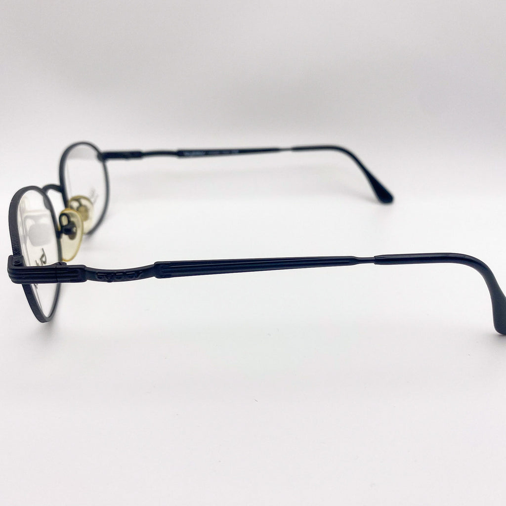 Black 1990s eyeglasses on a white background
