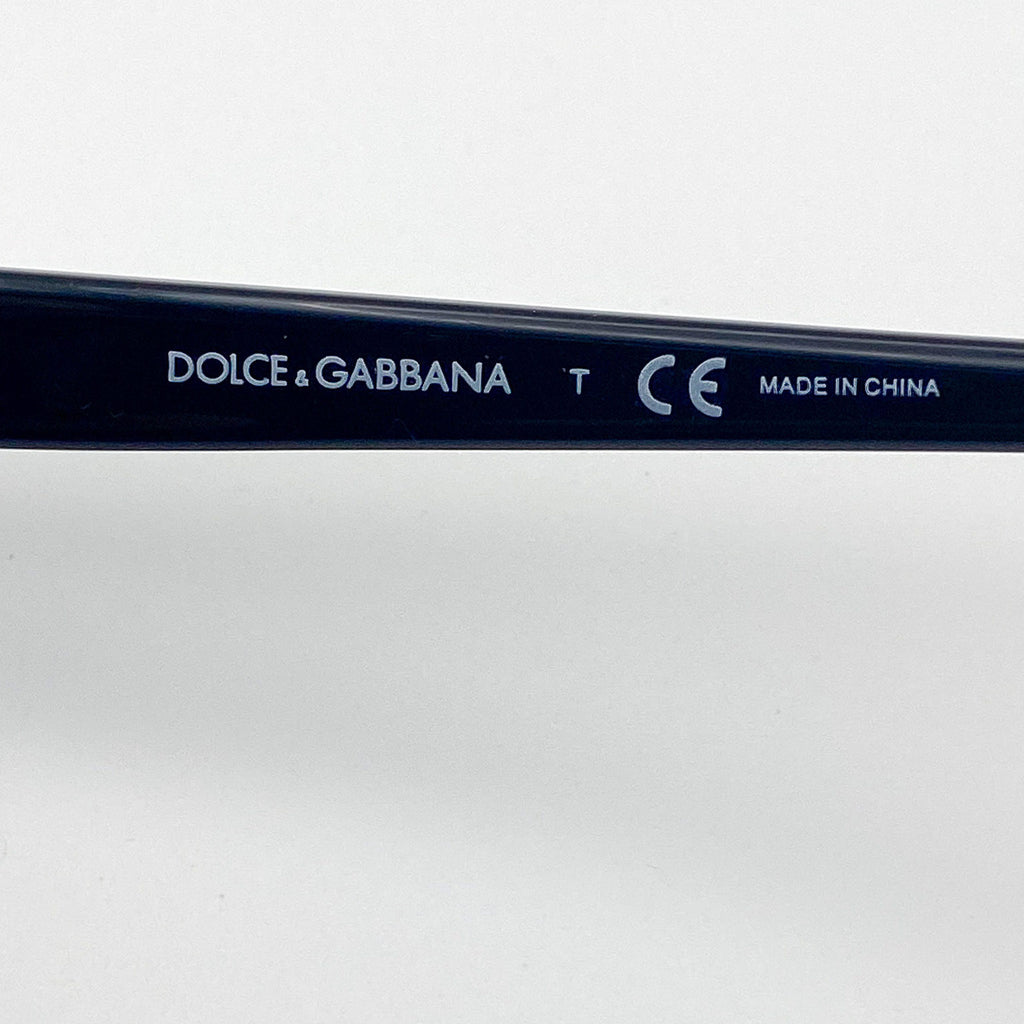 Dolce & Gabbana eyeglass frame with brand name and CE mark on a white background