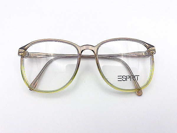 Vintage eyeglasses with a gradient design on a white background, featuring the Esprit brand.