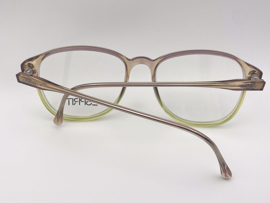 Brown and green eyeglasses on a white background
