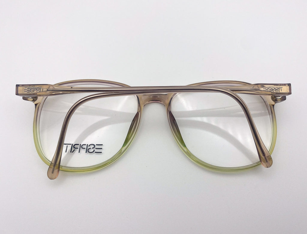 Pair of eyeglasses with a visible brand logo on a white background