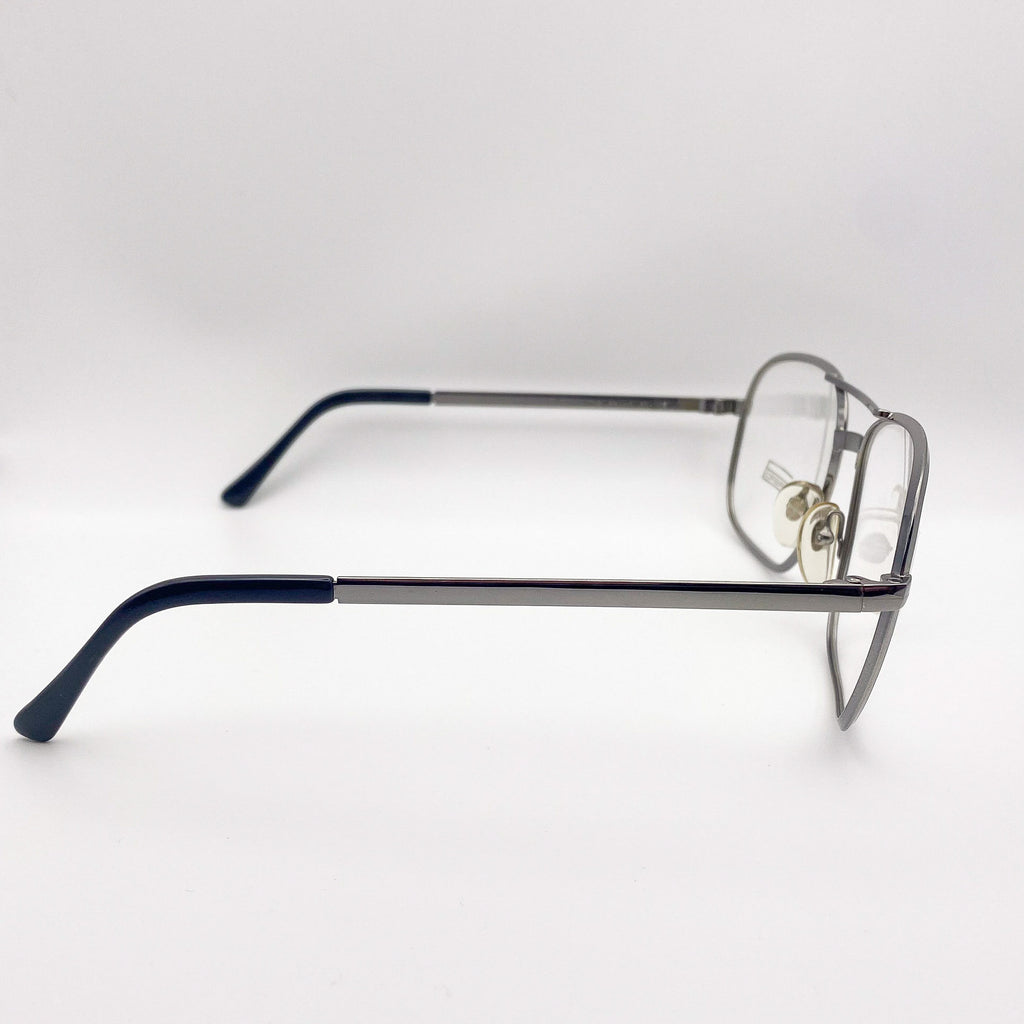 Silver aviators with black arms on a white background