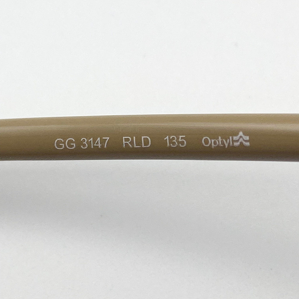 Brown temple stem with text and Optyl logo on a white background