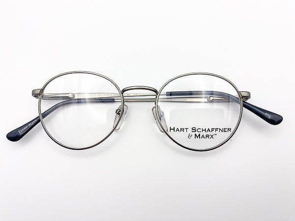 Round eyeglasses with 'Hart Schaffner & Marx' branding on a white background