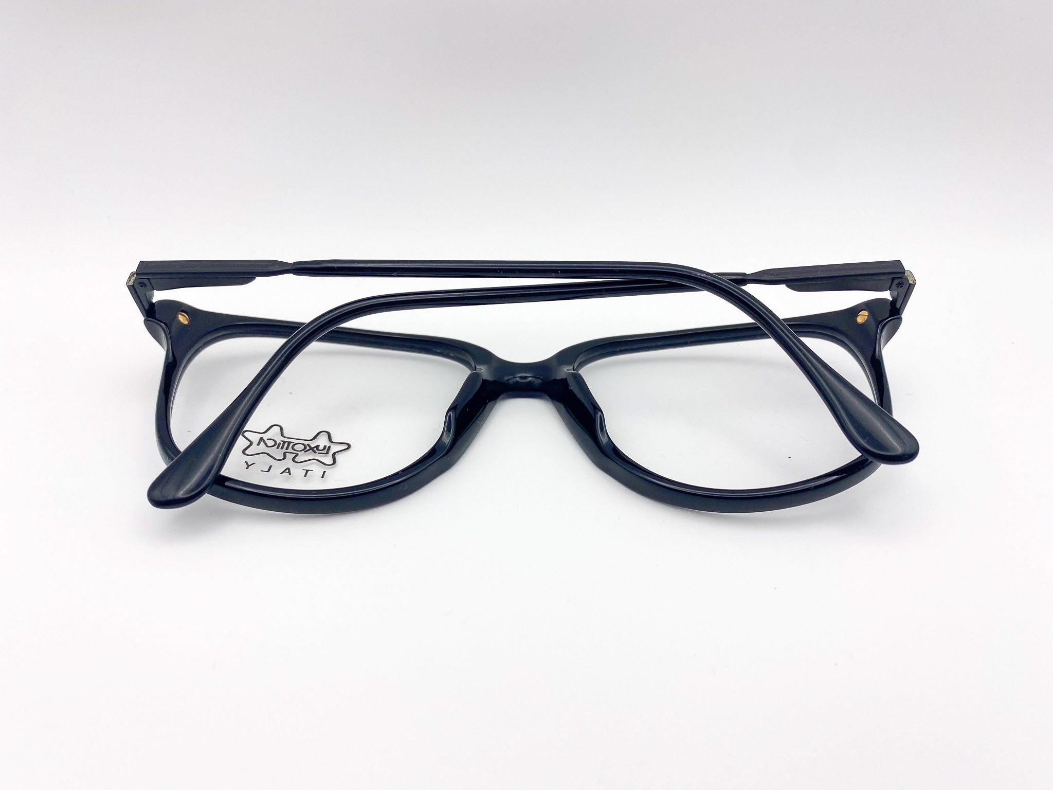 Black Luxottica eyeglasses on a white background