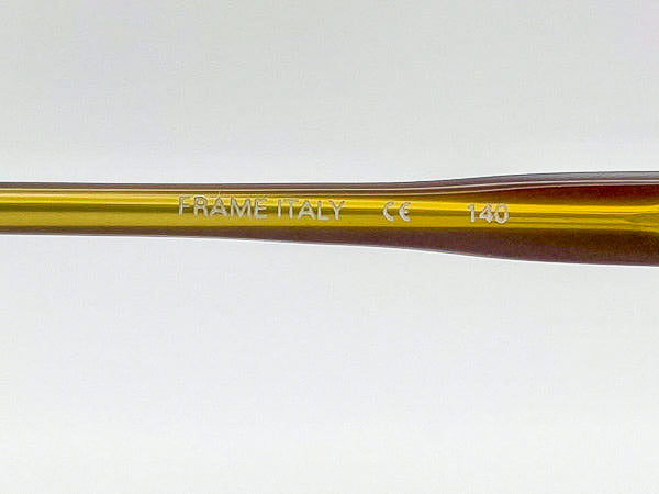 Close-up of a temple arm with 'FRAME ITALY' branding on a white background