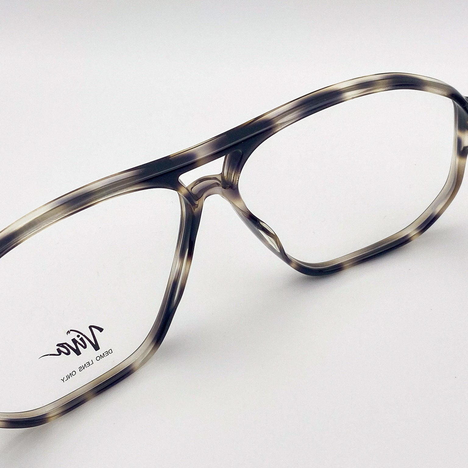 Vintage aviators with a tortoiseshell frame on a white background