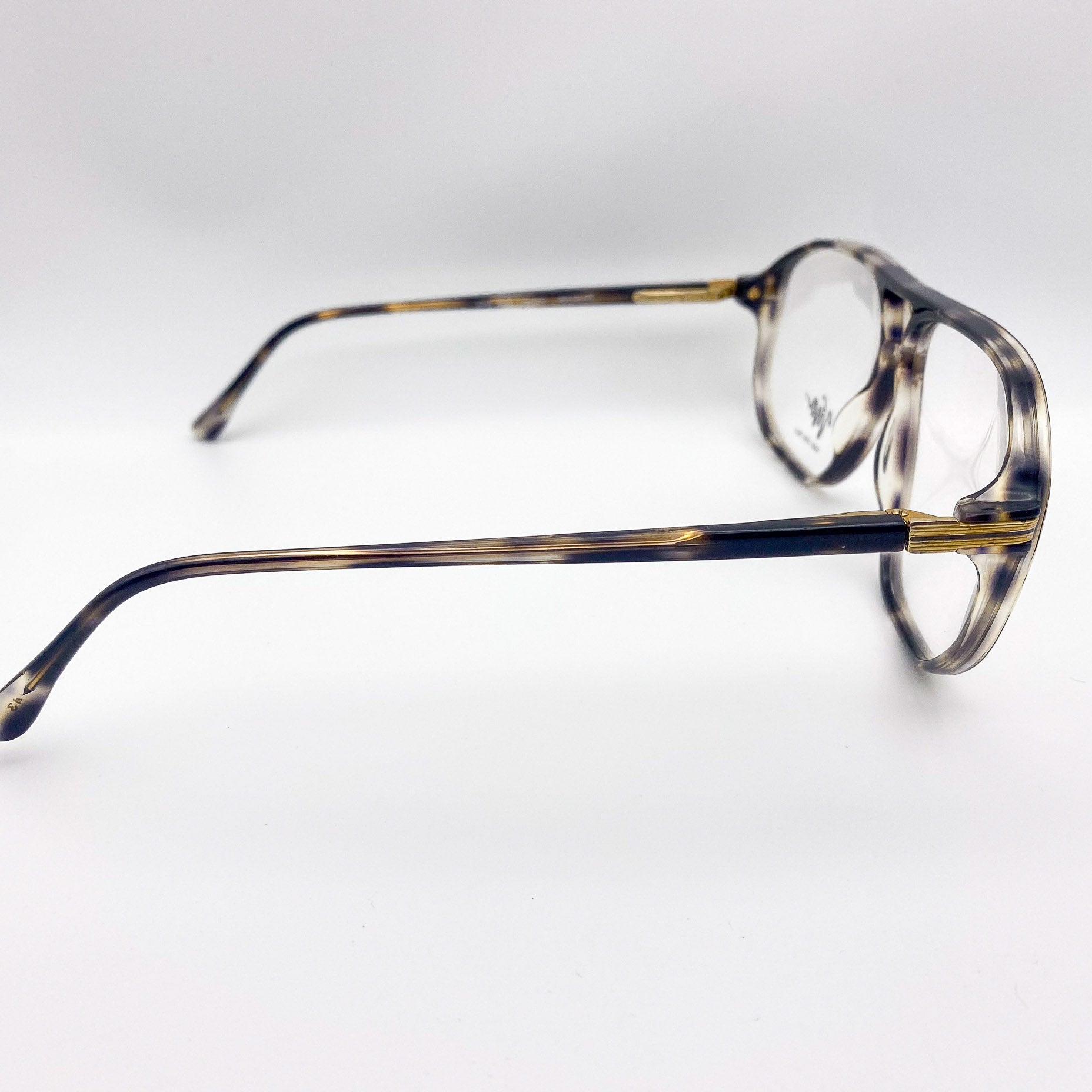 Tortoiseshell eyeglasses on a white background