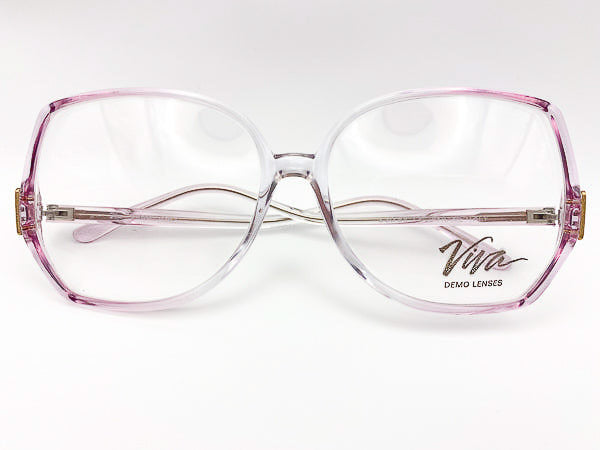 Purple and clear vintage eyeglasses with 'Viva' branding on a white background